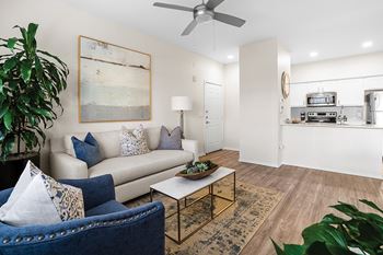 Upgraded units with hardwood style flooring in living areas*